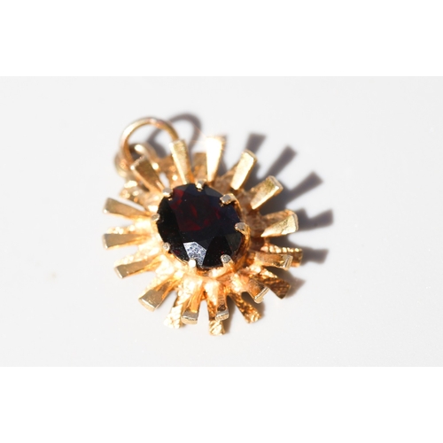 25 - Attractively Detailed, Garnet Set Sunburst Motif Pendant, Mounted in 9 Carat Yellow Gold, 2cm High