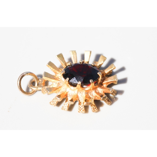 25 - Attractively Detailed, Garnet Set Sunburst Motif Pendant, Mounted in 9 Carat Yellow Gold, 2cm High