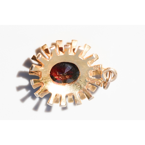 25 - Attractively Detailed, Garnet Set Sunburst Motif Pendant, Mounted in 9 Carat Yellow Gold, 2cm High