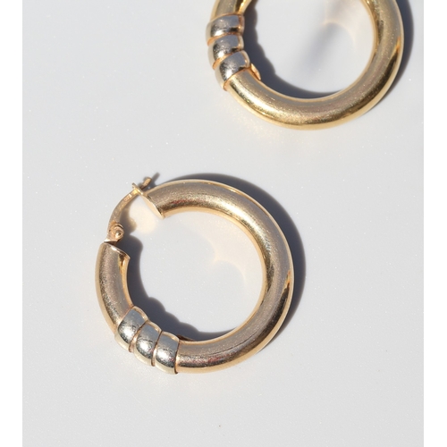 27 - Pair of 9 Carat Yellow Gold Hoop Earrings with White Gold Ribbon Wrap Motif, 3cm High