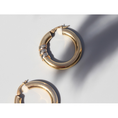 27 - Pair of 9 Carat Yellow Gold Hoop Earrings with White Gold Ribbon Wrap Motif, 3cm High