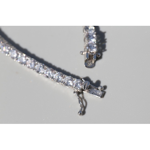 28 - Cubic Zirconia Set Tennis Bracelet, Mounted in 9 Carat White Gold, 18.5cm Long with Safety Clasps