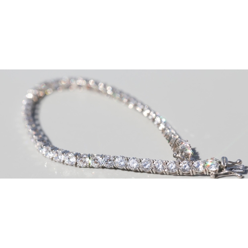 28 - Cubic Zirconia Set Tennis Bracelet, Mounted in 9 Carat White Gold, 18.5cm Long with Safety Clasps