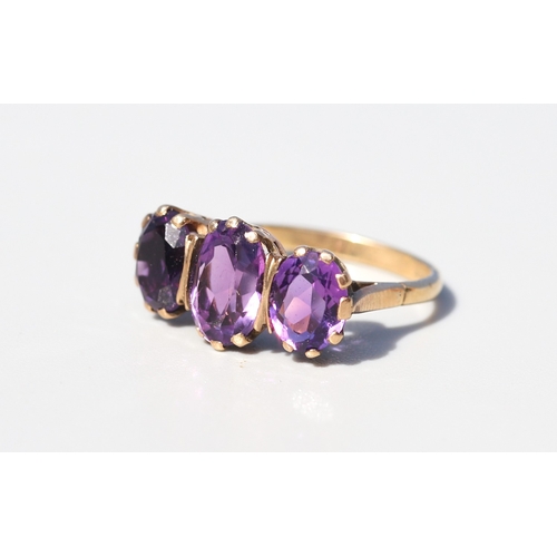 33 - Attractively Detailed, Amethyst Three Stone Basket Set Ring, Mounted in 9 Carat Yellow Gold, Ring Si... 