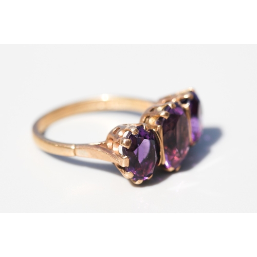 33 - Attractively Detailed, Amethyst Three Stone Basket Set Ring, Mounted in 9 Carat Yellow Gold, Ring Si... 