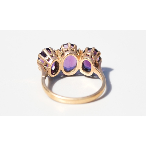 33 - Attractively Detailed, Amethyst Three Stone Basket Set Ring, Mounted in 9 Carat Yellow Gold, Ring Si... 