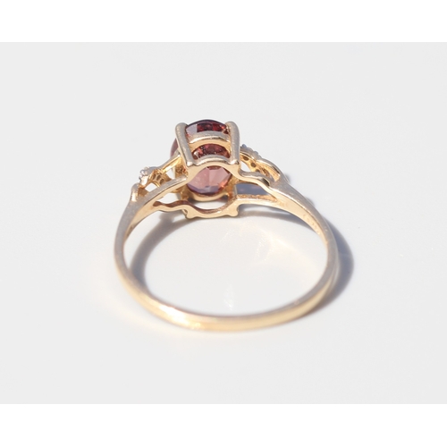 36 - Attractively Detailed, Rhodolite Tourmaline Set Ring with Diamond Inset Ribbon Motif Shoulders, Moun... 
