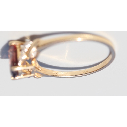 36 - Attractively Detailed, Rhodolite Tourmaline Set Ring with Diamond Inset Ribbon Motif Shoulders, Moun... 