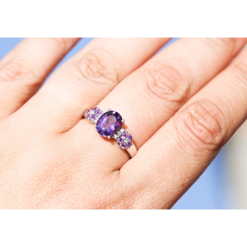 42 - Amethyst Set Ring with Further Amethyst and Diamond Set Daisy Clusters to Shoulders, Mounted in 9 Ca... 