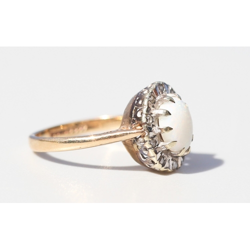 44 - Opal Set Ring with Diamond Inset Surround Mounted in 9 Carat Yellow Gold Ring Size K and a Half