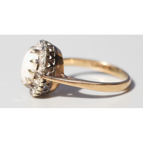 44 - Opal Set Ring with Diamond Inset Surround Mounted in 9 Carat Yellow Gold Ring Size K and a Half