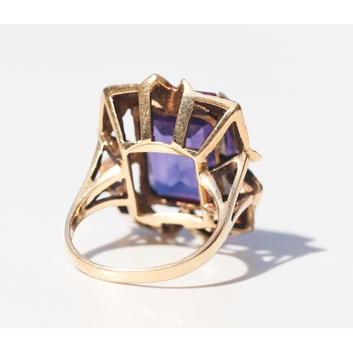 45 - Attractively Detailed, Emerald Cut Violet Amethyst Set Single Stone Ring Mounted in 9 Carat Yellow G... 