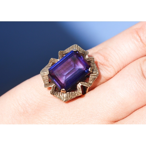 45 - Attractively Detailed, Emerald Cut Violet Amethyst Set Single Stone Ring Mounted in 9 Carat Yellow G... 