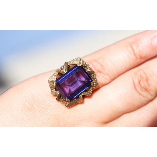 45 - Attractively Detailed, Emerald Cut Violet Amethyst Set Single Stone Ring Mounted in 9 Carat Yellow G... 