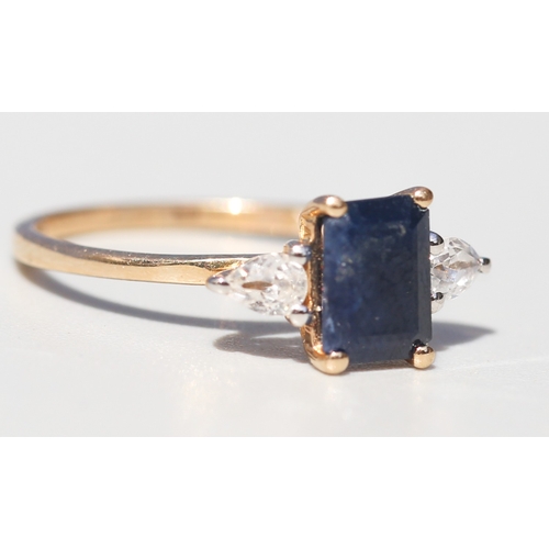 56 - Emerald Cut Sapphire Set Ring with Pear Cut White Sapphire Set to Shoulders, Mounted in 9 Carat Yell... 