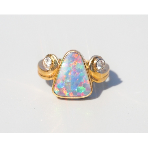 8 - Triangular Form Australian Opal Bezel Set Ring with Swirl Motif Diamond Set Shoulders, Mounted in 18... 