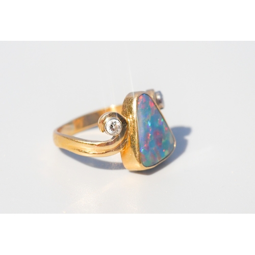 8 - Triangular Form Australian Opal Bezel Set Ring with Swirl Motif Diamond Set Shoulders, Mounted in 18... 