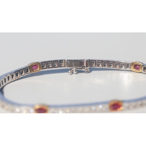 9 - Finely Detailed, Brilliant Cut Diamond Channel Set Bracelet with Six Stone Oval Cut Ruby Inset, Moun... 