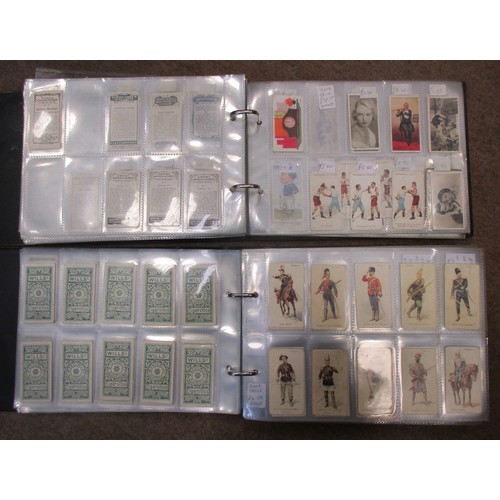8 - Coln. of mainly part sets and type cards, in 4 albums, in variable cond., incl. Adkin Character Sket... 