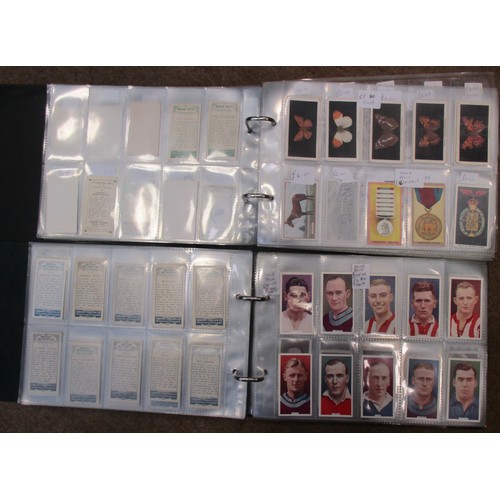 8 - Coln. of mainly part sets and type cards, in 4 albums, in variable cond., incl. Adkin Character Sket... 