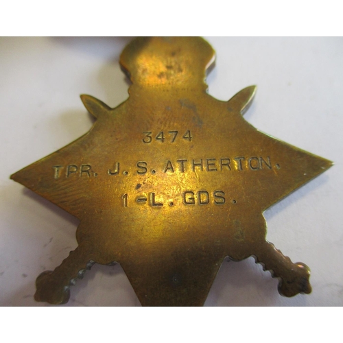 61 - 1914-15 Star trio to 3474 Tpr J.S. Atherton 1-L. Gds very fine, with matching ribbon bar. With copie... 