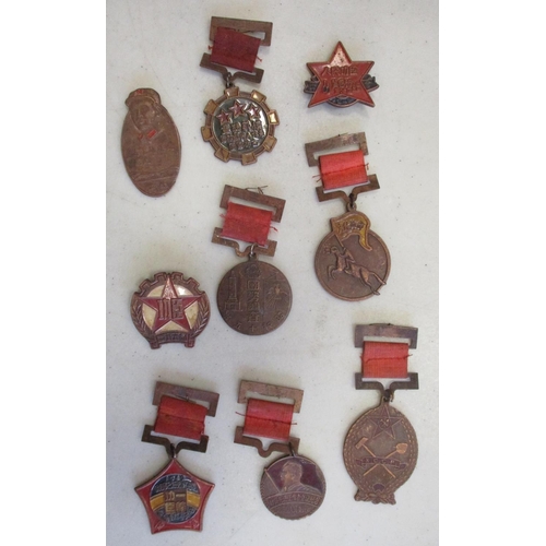 83 - China. Collection of medals and badges, mainly from 1940s-60s, some dated, most with enamel, in mixe... 