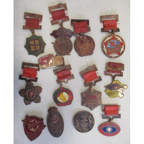 83 - China. Collection of medals and badges, mainly from 1940s-60s, some dated, most with enamel, in mixe... 