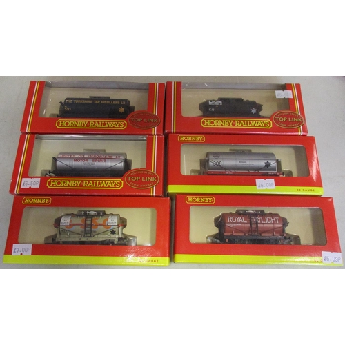 573 - Hornby. Collection of tank wagons with Esso grey 1634 No R6207 (5), ICI Methanol silver 308 No R6208... 