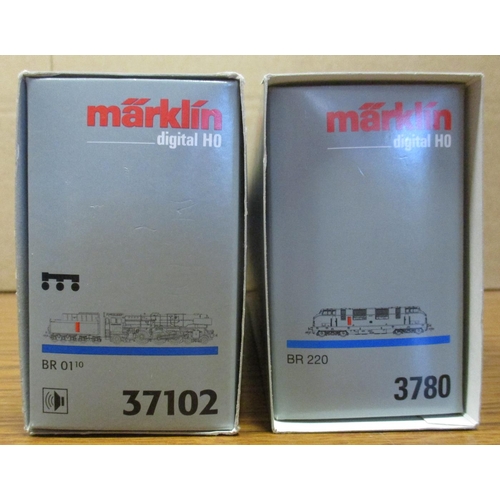 590 - Marklin. Pair of HO gauge Digital locomotives, excellent in good plus boxes, with BR black and red 0... 