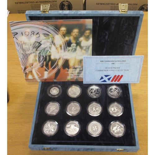 591 - 1986 'XIII Commonwealth Games' set of 12 silver cased proofs with Royal Mint certificate. (½B)