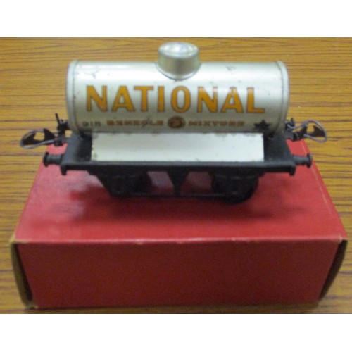 477 - Hornby. O Gauge collection in mixed condition with boxed goods wagons (5), No 1 Passenger Coach, unb... 