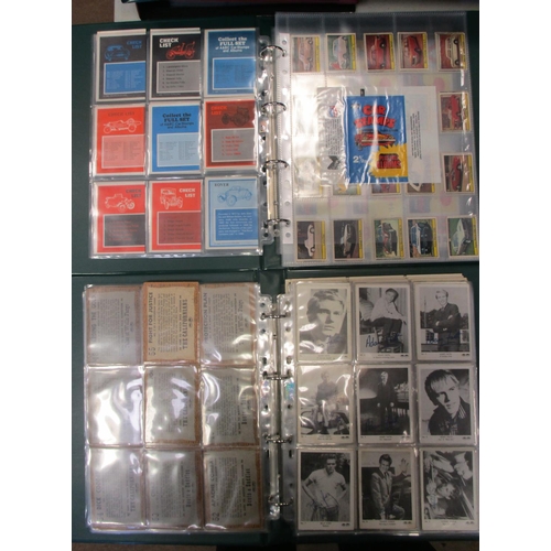 16 - A. & B.C. Collection of complete sets, in 2 albums, in variable cond., incl. Car Stamps set with wra... 