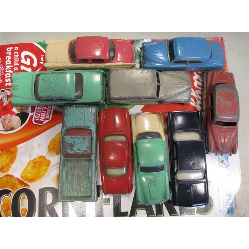 305 - Dinky. Early collection with racing/sports cars (12), cars (24) and lorries/vans (11) in very playwo... 