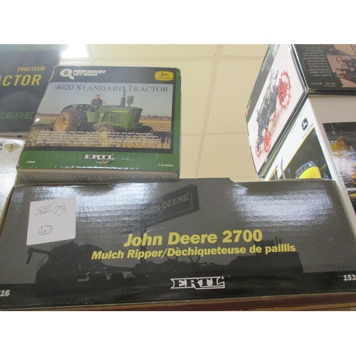 319 - ERTL. Collection of 1:16 scale John Deere tractors and construction models generallly mint in excell... 