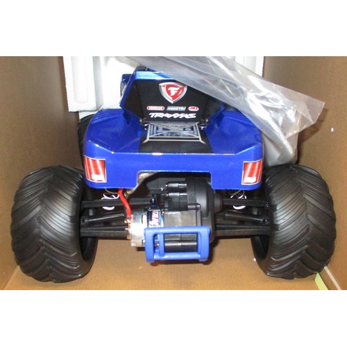 208 - Range of Radio control vehicles generally excellent to mint in good to excellent boxes including Tra... 