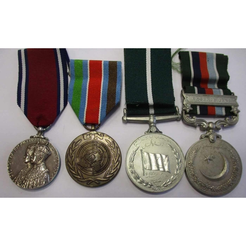 2 - Mixed collection with:
1. 1880 Afghanistan Medal no clasp naming partly erased to 6 Bde/1175 Pte T. ... 