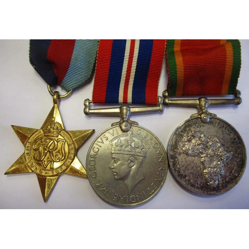 29 - WW1 & WW2 family group with:
1. BWM, Victory Medal (Bi-lingual) and Memorial Scroll to Pte J.E. Keen... 