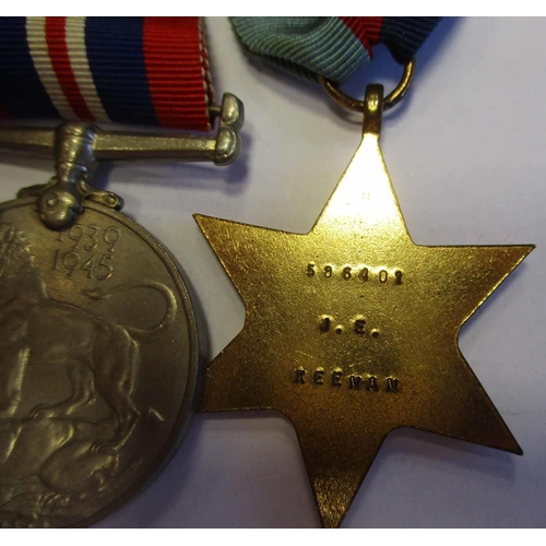 29 - WW1 & WW2 family group with:
1. BWM, Victory Medal (Bi-lingual) and Memorial Scroll to Pte J.E. Keen... 