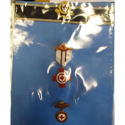 4 - Red Cross collection of medals, badges, certificates (12) etc in album, mainly British Red Cross, fe... 