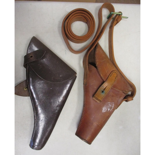 66 - Mixed collection with 2 leather pistol holsters, 2 webbing pistol holsters, 1915 Short & Mason Verne... 