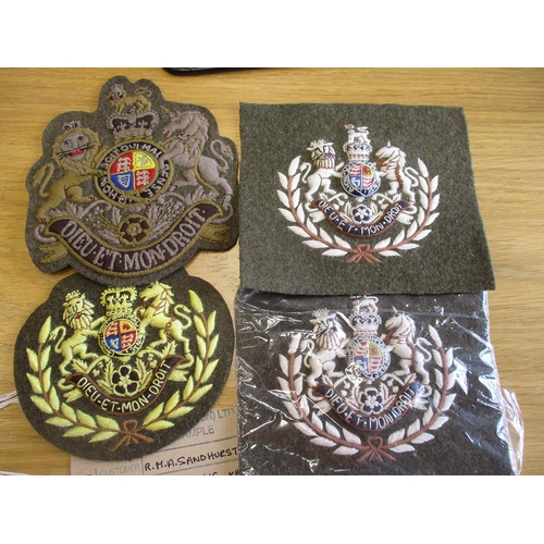 91 - Excellent collection of largely cloth and embroided rank, cap and trade badges, many labelled sample... 