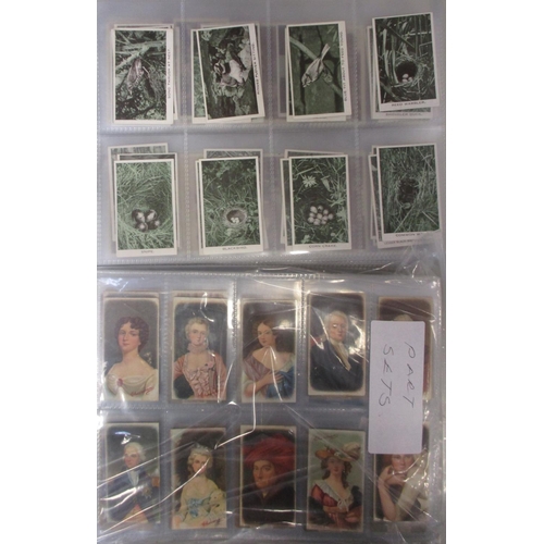 23 - Coln. of complete and part sets, in albums and plastic sleeves, in variable cond., incl. Churchman T... 