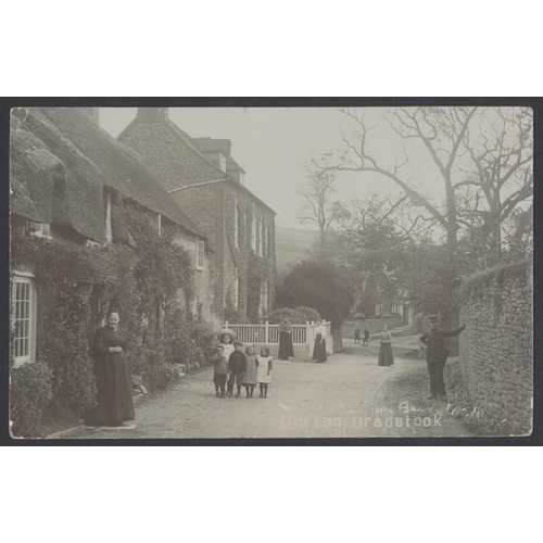 122 - Dorset. Burton Bradstock. Comprehensive coln. in modern album with RP  and ptd. village views incl. ... 