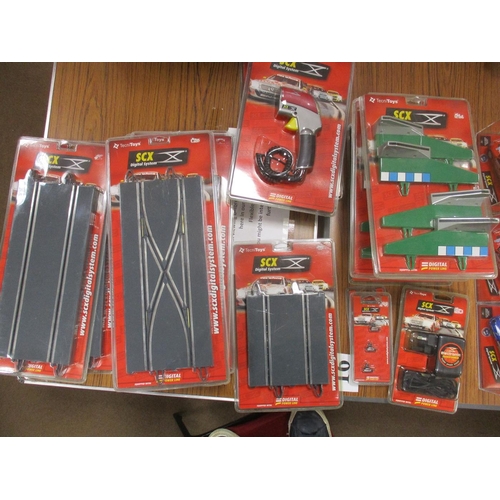 263 - Collection of SCX Digital System sets, cars, track and accessories, generally mint in excellent to m... 