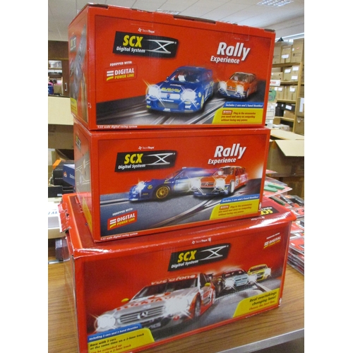 263 - Collection of SCX Digital System sets, cars, track and accessories, generally mint in excellent to m... 