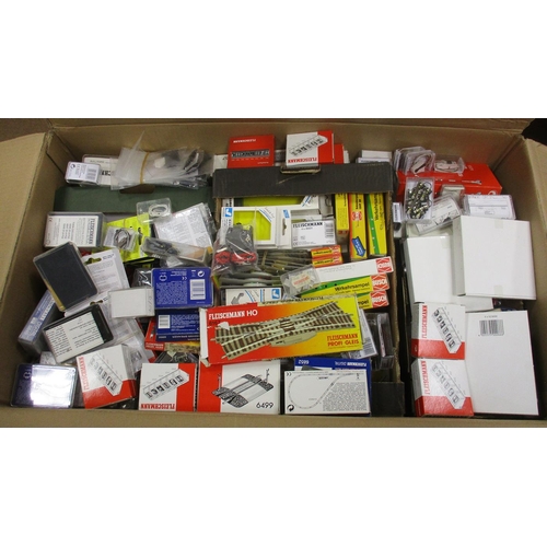 466 - Accumulation of N gauge and OO/HO gauge kits, scenery, track, spares and other extras, generally min... 