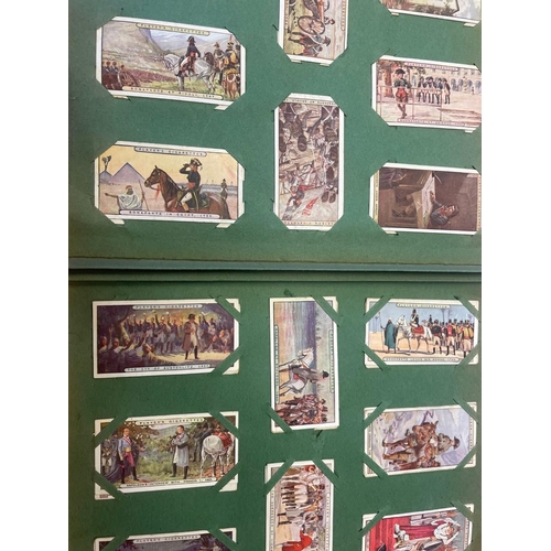 61 - Mostly complete sets in corner mounted album including  Players 1914 Victoria Cross, Napoleon 1915, ... 