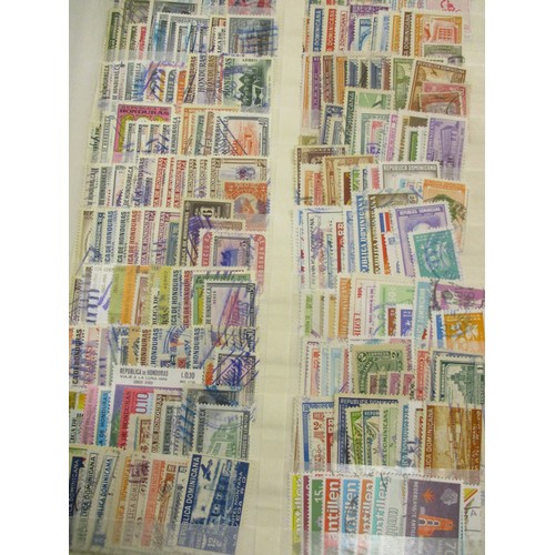 10 - World untidy misc coln in 35 stockbooks/vols, most of the stockbooks being layered with dupl, much U... 