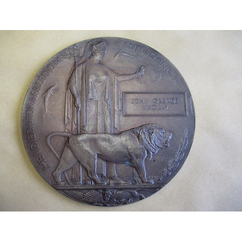 131 - WW1 Memorial Plaques to 1. John George Mackay good very fine, several possibilities.
2. David Scott ... 