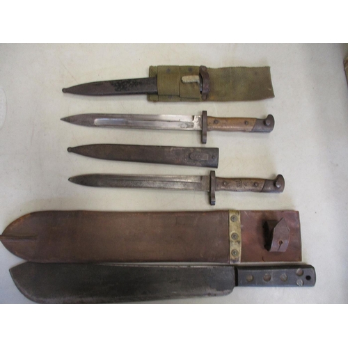 216 - Collection with 1891 Volunteer Pattern sword bayonet & scabbard by Wilkinson, pommel marked M/4 A&SH... 